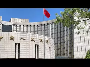 China Cuts Forex Reserve Ratio in Bid to Support Yuan