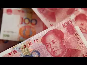 Offshore Yuan Weakens Past 7 Per Dollar