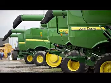 Deere Cuts Annual Profit Outlook as Farmer Demand Slows