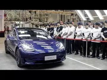 Tesla Delivers First China-Built Cars