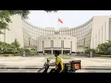 China Central Bank Unexpectedly Cuts Key Rate to Spur Growth