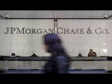 JPMorgan Suspends Buybacks as Earnings Miss Estimates