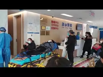 Covid Crowds Shanghai Hospitals as Cases Rise