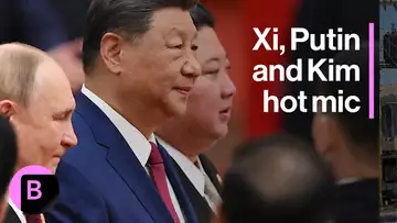 Xi and Putin Heard Discussing Longevity at Military Parade