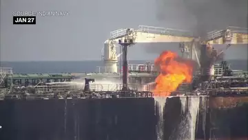 Oil tanker hit by Houthi missile catches fire in Red Sea