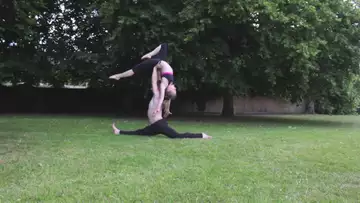 Duo Acrobatics Yoga In The Park