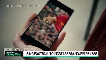 Alibaba, BYD Try to Turn Football Fans Into Shoppers